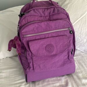 large Kipling backpack with wheels in perfect condition